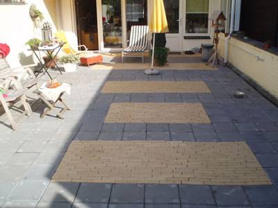 Sierbestratingen,oprit voor auto. ophogen van de tuin